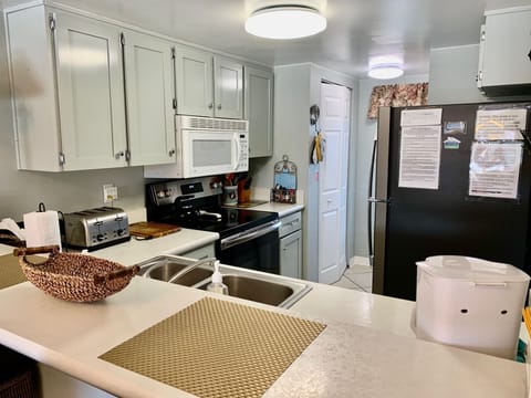 Fridge has instructions on side for rules, Wi-Fi, checkout instructions 