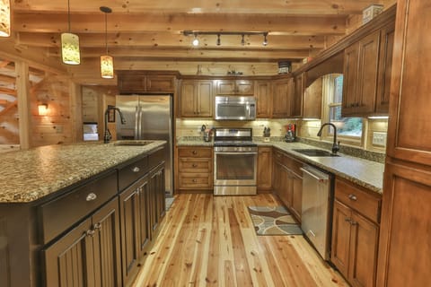 Fully stocked state of the art kitchen, leathered granite, stainless appliances