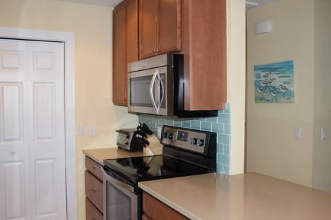 Fully equipped kitchen with stainless appliances