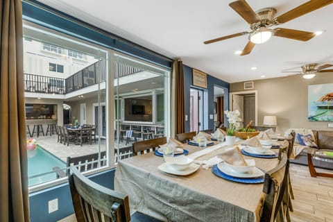 Dining: Expansive dining area and kitchen bar seating to accommodate large meals.