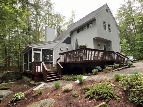 Outdoor living at its finest on a private wooded lot. 