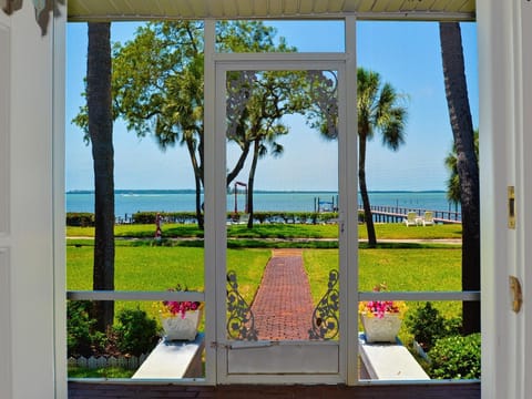 The waterfront and dock is just outside the front door
