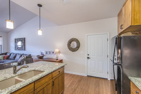 Entry- - Entry point of this unit is located in the kitchen.