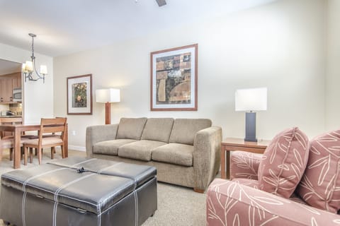 Living Area- - Queen size sofa sleeper and twin size ottoman sleeper.