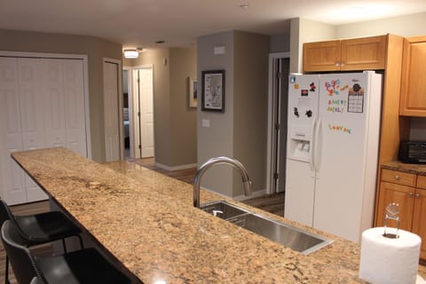 View of hallways from kitchen.