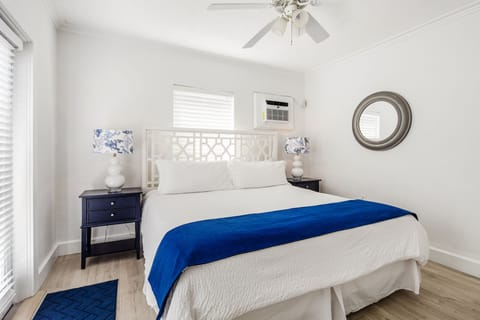 King bedroom has bedside lighting and wall A/C
