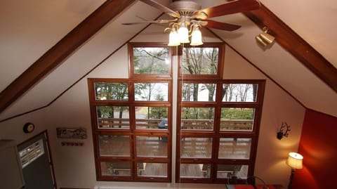 View of Lake Harmony Through A Wall Of Expansive Floor To Ceiling Windows