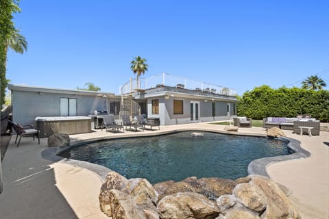 Pebble Tech pool with waterfall.