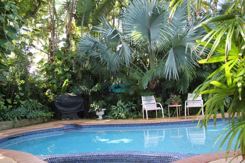 BBQ next to the pool and enjoy the gardens