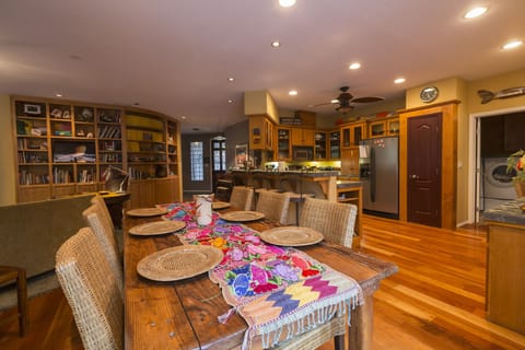 Farm table in dining area.  Open plan, great for visiting.