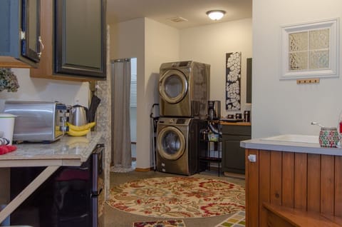 On left front is one part of the kitchen - the other part continues a bit on the