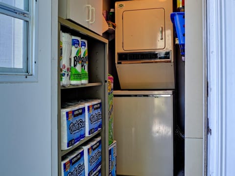 In-unit washer and dryer and toiletry supply room