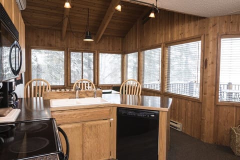 Dining room has lots of windows with great views.