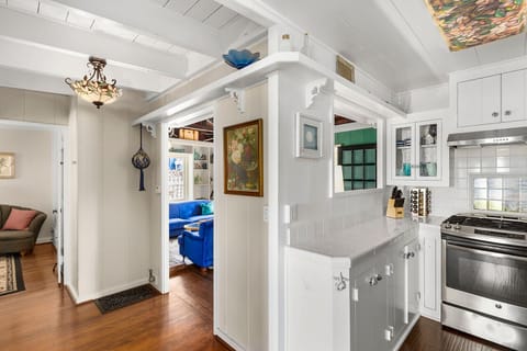 Kitchen going into living room and 2 of the bedrooms