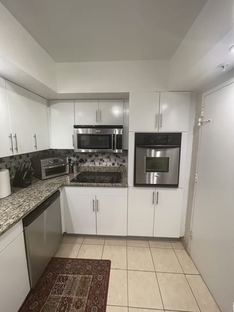 Fully updated kitchen with granite countertops & stainless appliances.