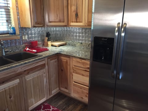 Fully equipped kitchen. Quartz countertops. 
