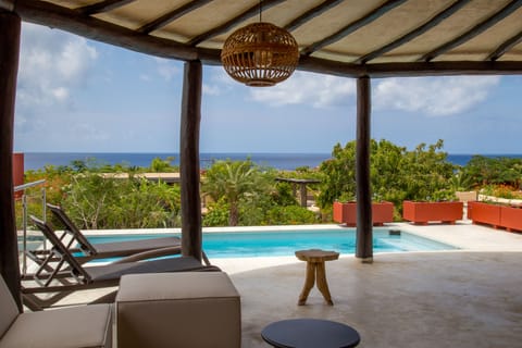 Enjoy sun or shade by the pool
