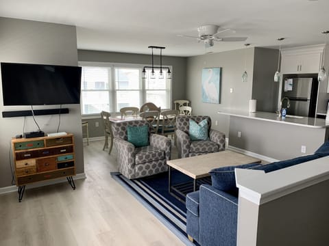 Roomy living room and dining area. Brand new flooring throughout.