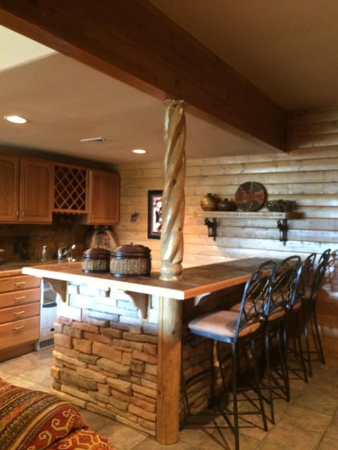 wet bar in lower level with ice machine