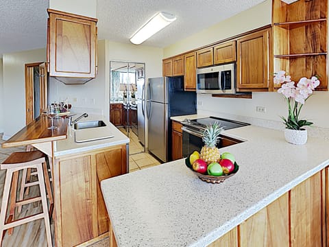 Kitchen - Fully stocked kitchen with stainless steel appliances