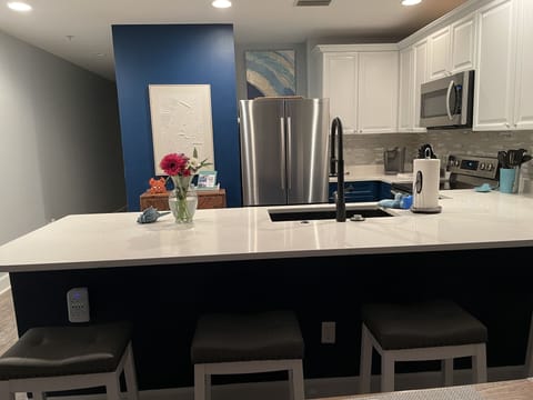 BAR SEATING FOR FOUR.  WATCH MOM COOK.