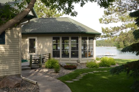 Screen porch opens up the living area to beautiful outdoors without the bugs