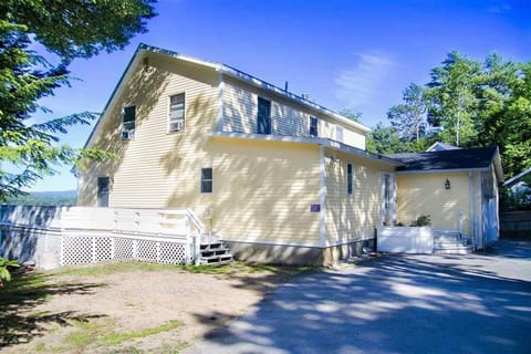 Side of house with add'l parking area