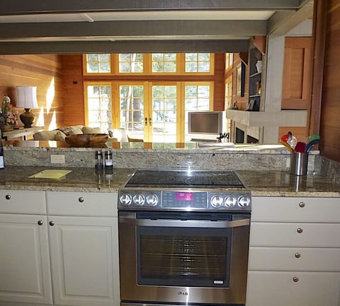 Newly remodeled kitchen looking into living room.