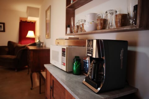 Kitchenette with coffee, micro and full fridge. BBQ on the patio!