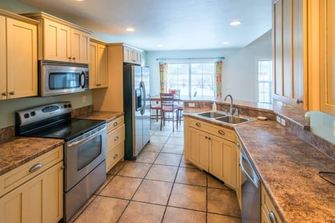 Whip up a tasty meal in the charming kitchen that opens up to the living area, and connects to the dining room.