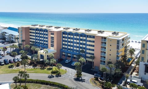 Birdseye view of Pelican Isle. Straight on view of the gulf. Wide beach front.