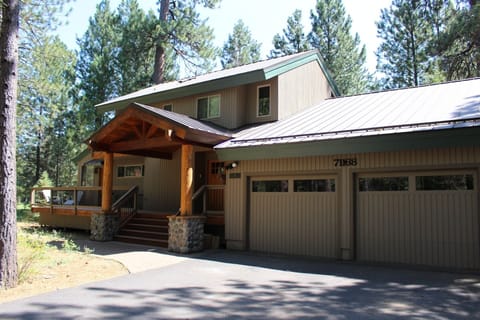 Front of house including garage.