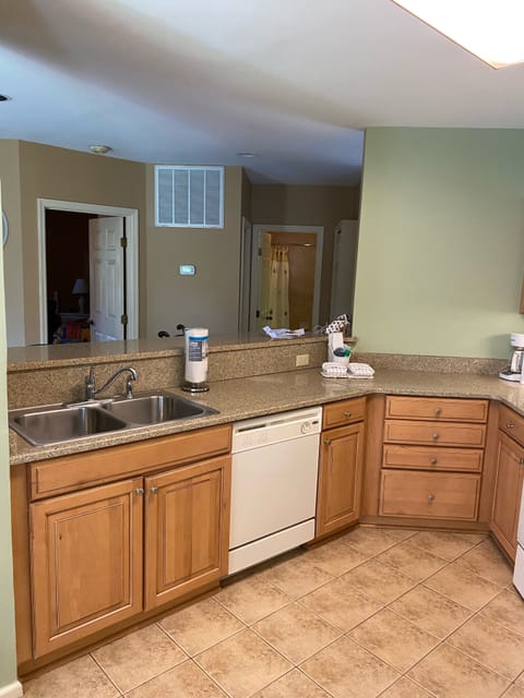 Kitchen with tile floors and granite counters
