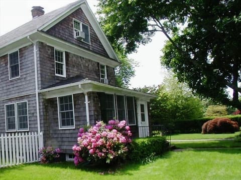 Beautifully Maintained Residential Landscaping with many blooms for cut flowers.