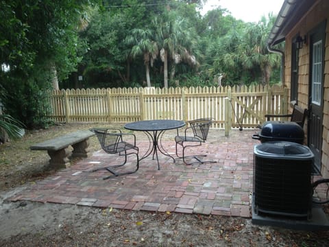 Fenced yard with bricked patio