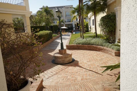 Looking out from the front door of the Town House towards the  Main  Pool.