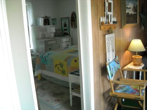 One bedroom with a double bed & cable T.V.
