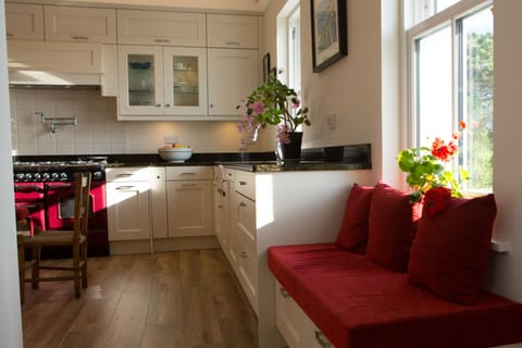 Window seat looking out to Cliffs with agricultural view