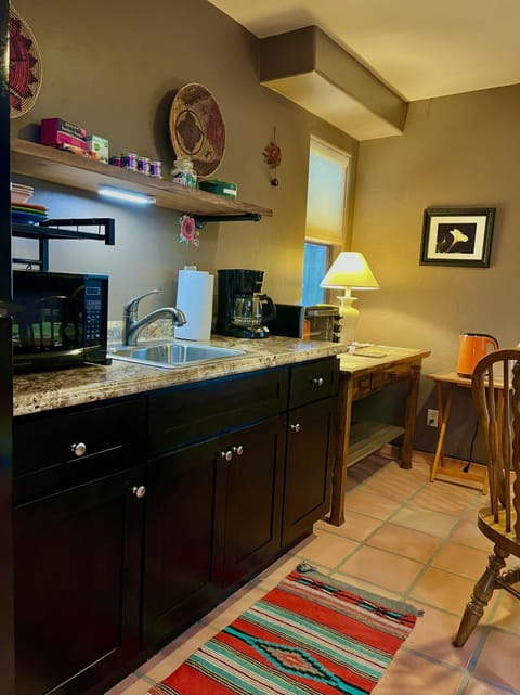 Fully equipped kitchenette with 18 cu. ft. refrigerator