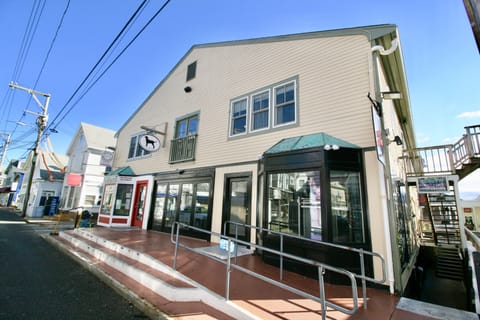 Condo is located on the top floor of mixed use building on Commercial St.