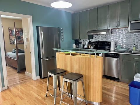 Kitchen and door into second bedroom