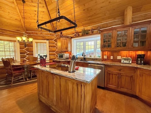 Kitchen with an island for cooking and entertaining, updated