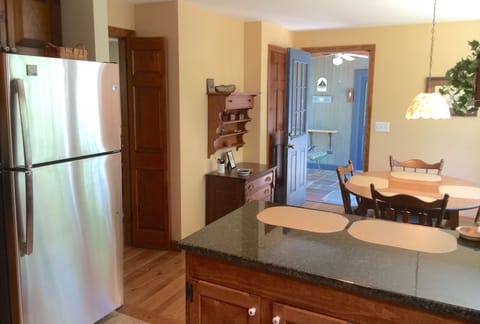 Open kitchen next to cozy breakfast room