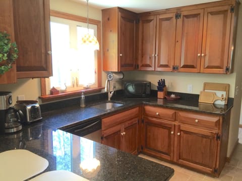Recently remodeled kitchen with granite countertops