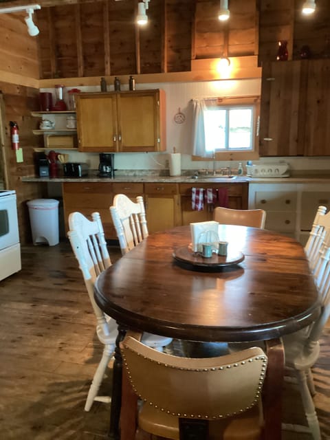 Well stocked kitchen and dining area.