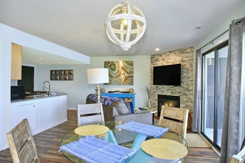 Open floor plan for optimal use of fireplace and 55 inch TV