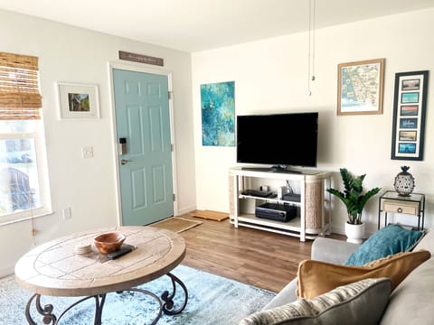 Living room is comfortable, cozy and equipped with stereo & cable TV.