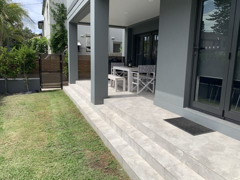 Front lawn patio - sunny front opening from the TV/lounge room and kitchen areas
