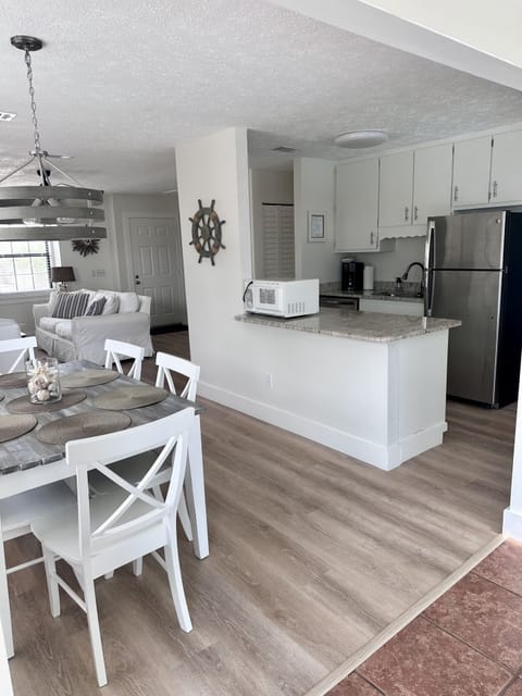 Large kitchen island is perfect for cooking and serving snacks and meals.