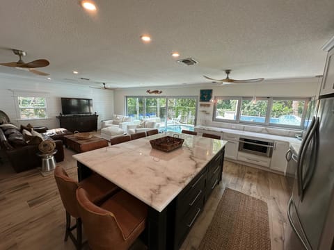 2nd living area & kitchen. Doors & windows open creating an in/outdoor room.